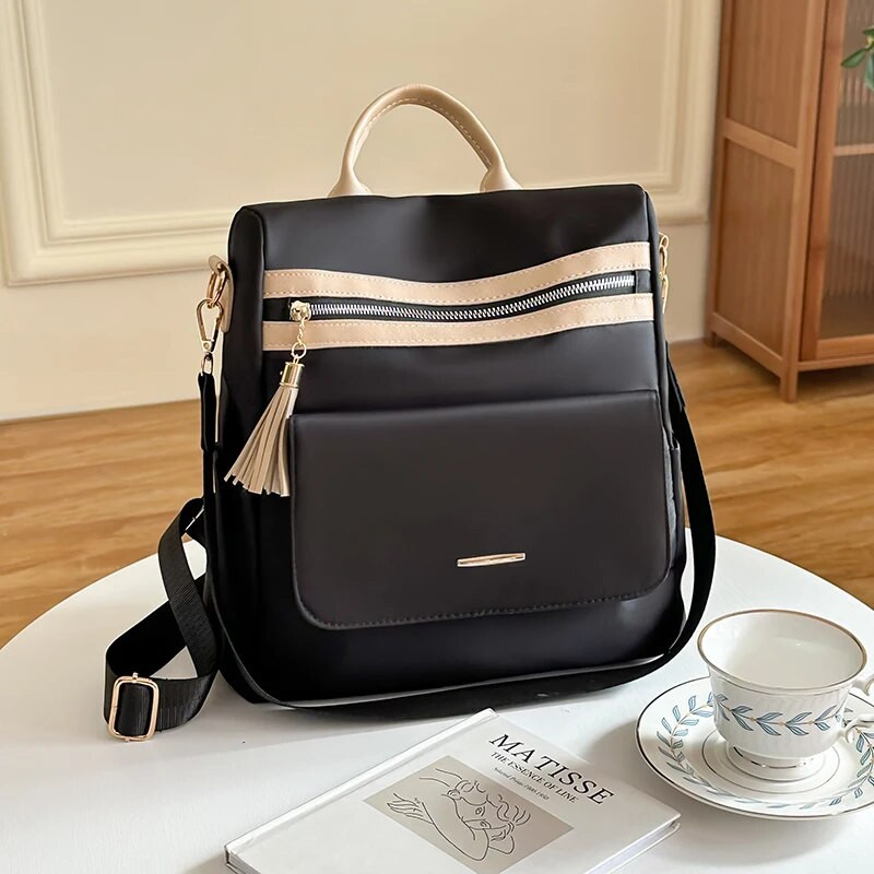 Sieviešu neilona mugursoma Lielas ietilpības pretaizdzīšanas mugursomas Daudzfunkcionāla atpūtas ceļojumu mugursoma jauniešu dizaina studentu somas