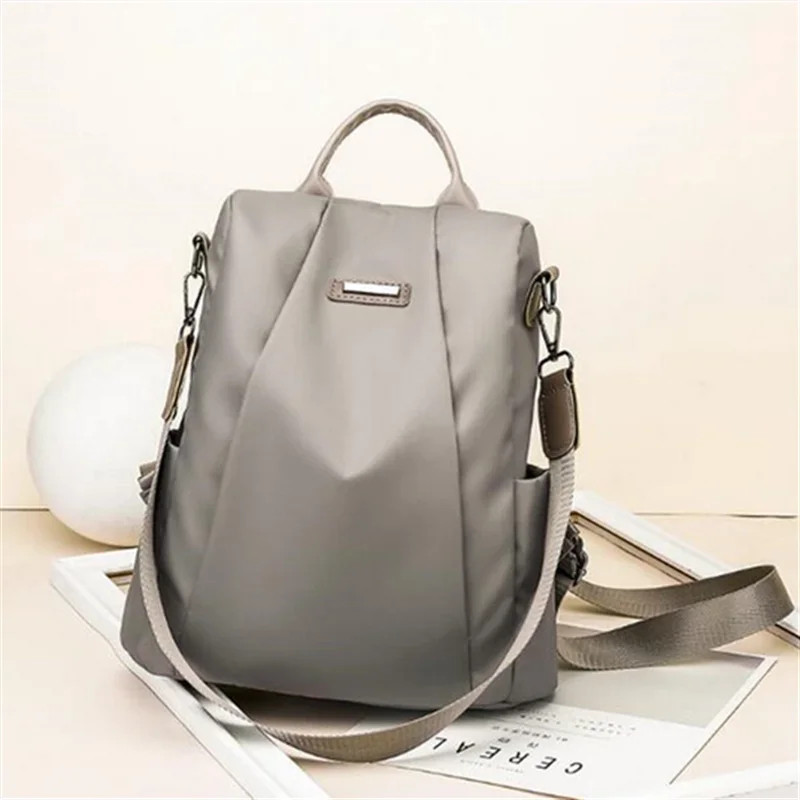 Sieviešu pretaizdzīšanas mugursoma, ūdensnecaurlaidīga auduma liela sieviešu plecu soma, liela ietilpība, vienkārša stila ikdienas Mochila ceļojumi