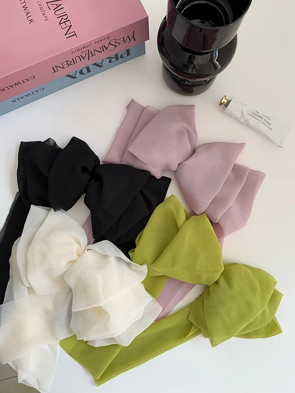 Šifon, višeslojna ukosnica s velikom ukosnicom i mašnom za žensku vilinsku vrpcu na stražnjoj glavi, proljetna štipaljka, francuska lijena frizura