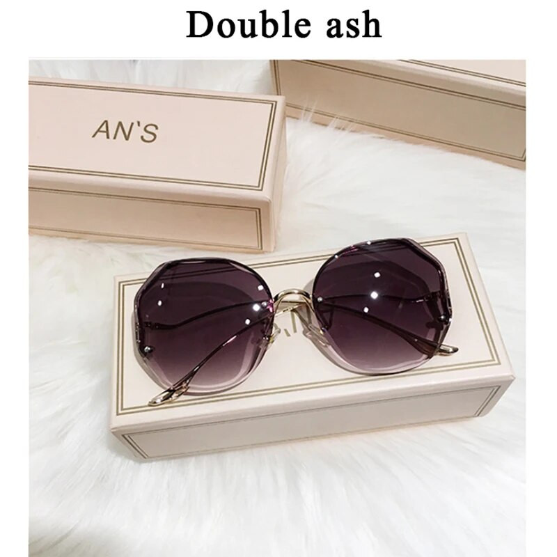 Ženske sunčane naočale bez okvira 2023. Nove modne vintage okrugle ružičaste naočale