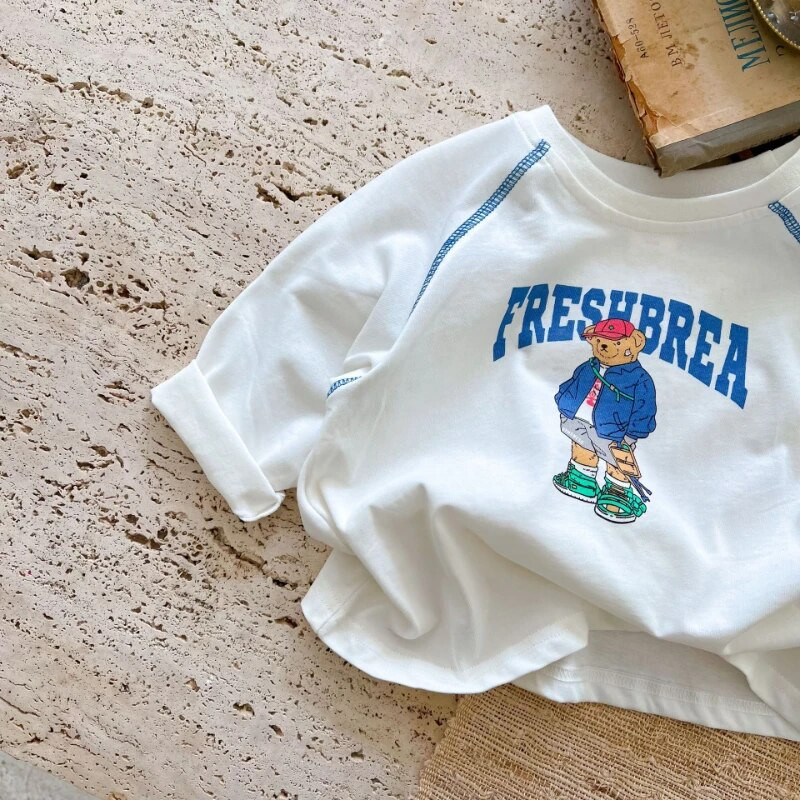 2023 Kids Uus puuvillane pikkade varrukatega trükitud T-särk poistele tüdrukutele armsad multikad Laste ühevärvilised pehmed vabaaja pikkade varrukatega topid