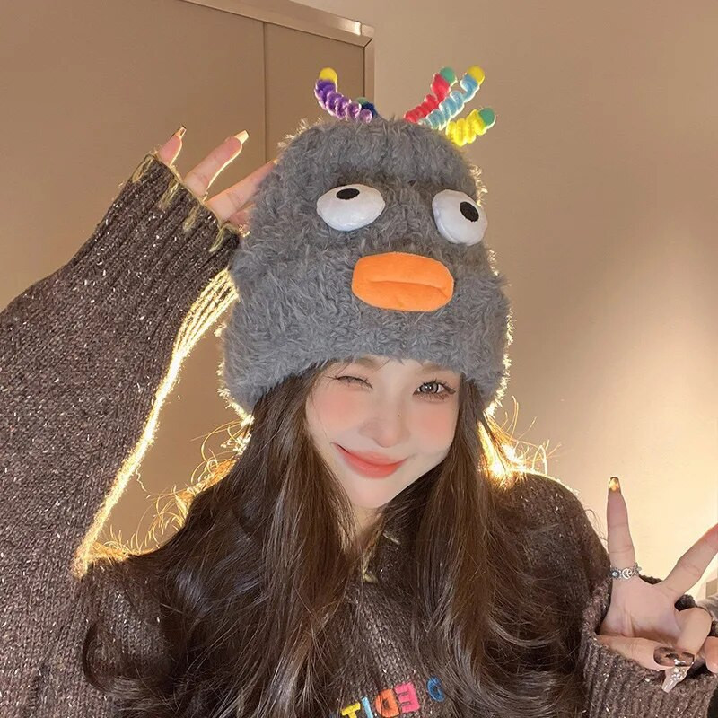 Plīša, smieklīgas, mazas briesmoņu cepures sievietēm, ziema, jauka, silta vilna, multfilma, acis, cepures Sthudent korejiešu trikotāžas mīksta pupiņa, bērns ārā