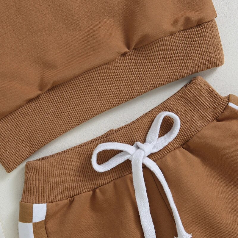 Modes zīdaiņiem, maziem bērniem, mazuļiem, zēniem, rudens apģērbu komplektiem, šaha planšetdatoriem.