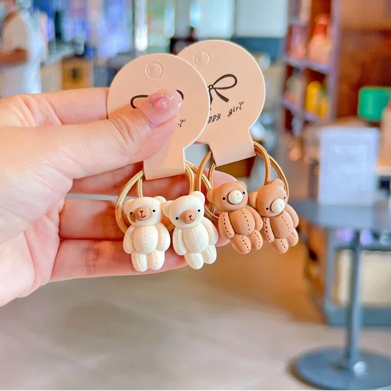 JAUNA korejiešu multfilma šokolādes elastīgās matu lentes Lācis Truša matu saites Virve Meiteņu gumija Smaids Zieds Scrunchies Bērnu zirgastes turētājs