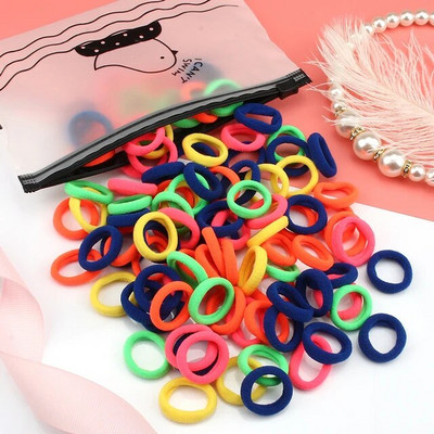 50/100 tk/komplekt Tüdrukute elastsed juuksepaelad Värvilised nailonist väikesed kummipaelad Laste hobusesabahoidja Juukselipsud Lastele Juuste aksessuaarid