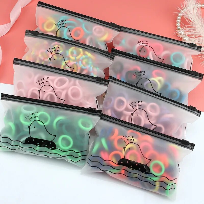 50/100 tk/komplekt Tüdrukute elastsed juuksepaelad Värvilised nailonist väikesed kummipaelad Laste hobusesabahoidja Juukselipsud Lastele Juuste aksessuaarid