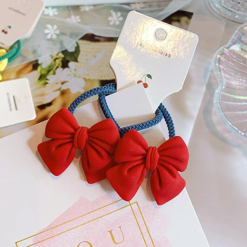 2gab Cute Bowknot elastīgas matu lentes Candy Color Meiteņu matu virve Jauki zirgastes turētājs Taurītes matu kaklasaites bērniem