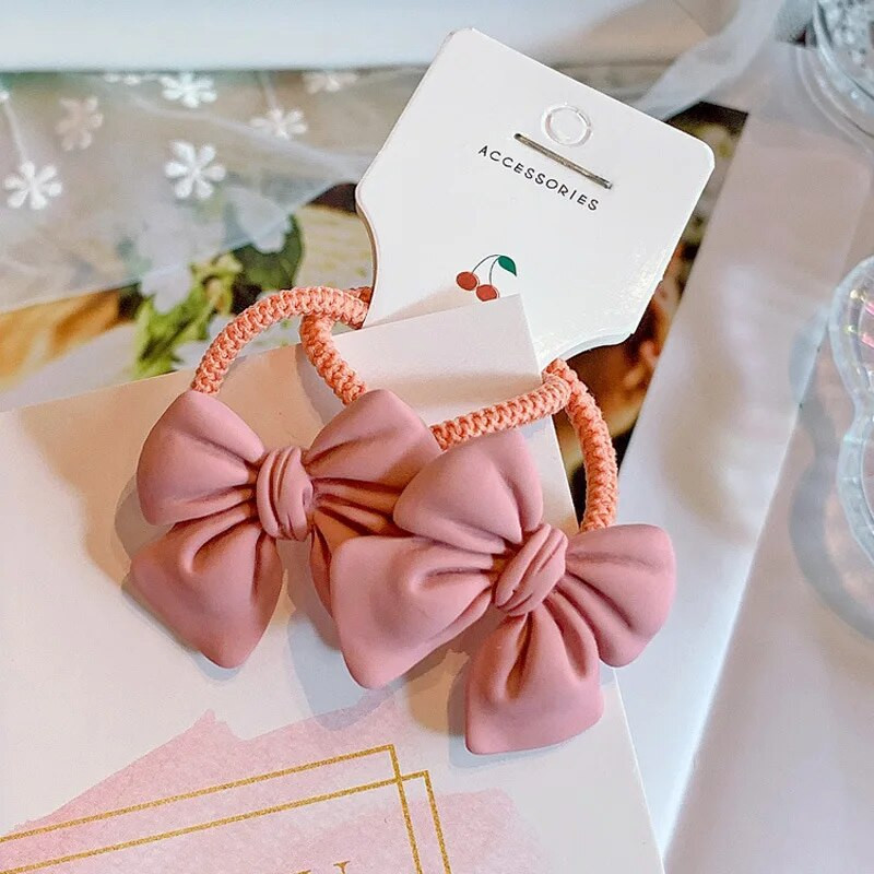 2gab Cute Bowknot elastīgas matu lentes Candy Color Meiteņu matu virve Jauki zirgastes turētājs Taurītes matu kaklasaites bērniem