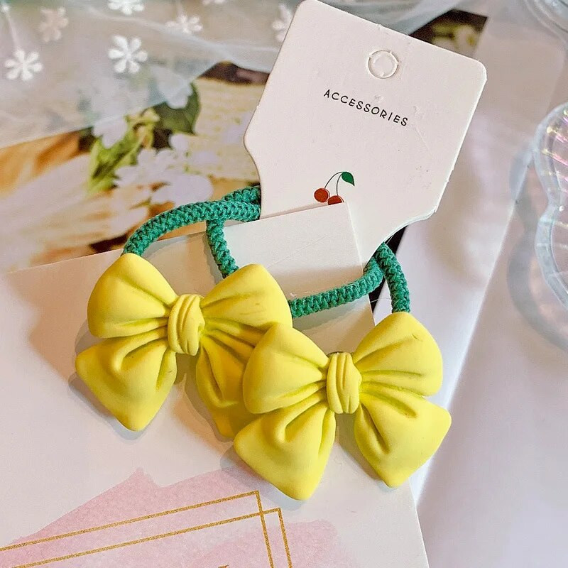 2gab Cute Bowknot elastīgas matu lentes Candy Color Meiteņu matu virve Jauki zirgastes turētājs Taurītes matu kaklasaites bērniem
