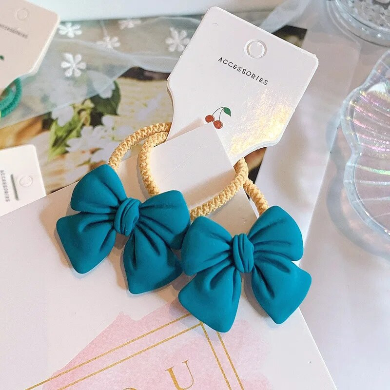 2gab Cute Bowknot elastīgas matu lentes Candy Color Meiteņu matu virve Jauki zirgastes turētājs Taurītes matu kaklasaites bērniem