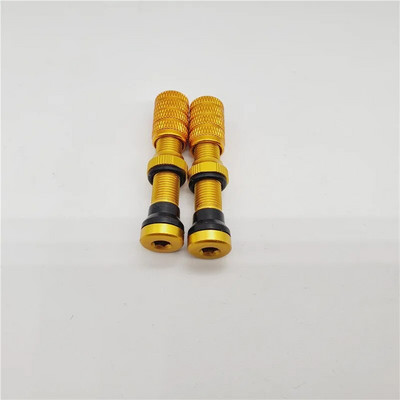 Velosipēda Schrader bezkameru vārsta bezcauruļu riepa priekš MTB amerikāņu diskiem ar alumīnija sakausējuma vāciņu 40 mm Schrader kātiem