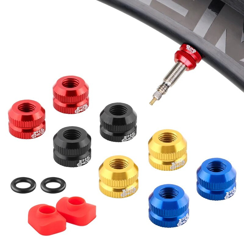 MUQZI 2PCS riepas vārsta uzgrieznis MTB šosejas velosipēda bezkameru loks īpaši viegla alumīnija sakausējuma Presta vārsta aizsardzības skrūves vārsta fiksētā paplāksne