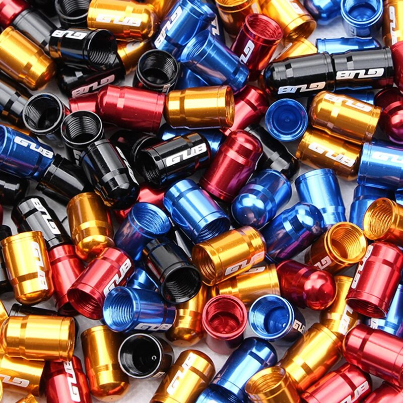 Καπάκια βαλβίδας βαλβίδας Schrader GUB 2 ΤΕΜ. Καπάκι βαλβίδας ελαστικού ποδηλάτου από κράμα αλουμινίου 4 χρώματα American Tire Dustproof Καπάκια βαλβίδας ποδηλάτου Καλυμμένο ελαστικό