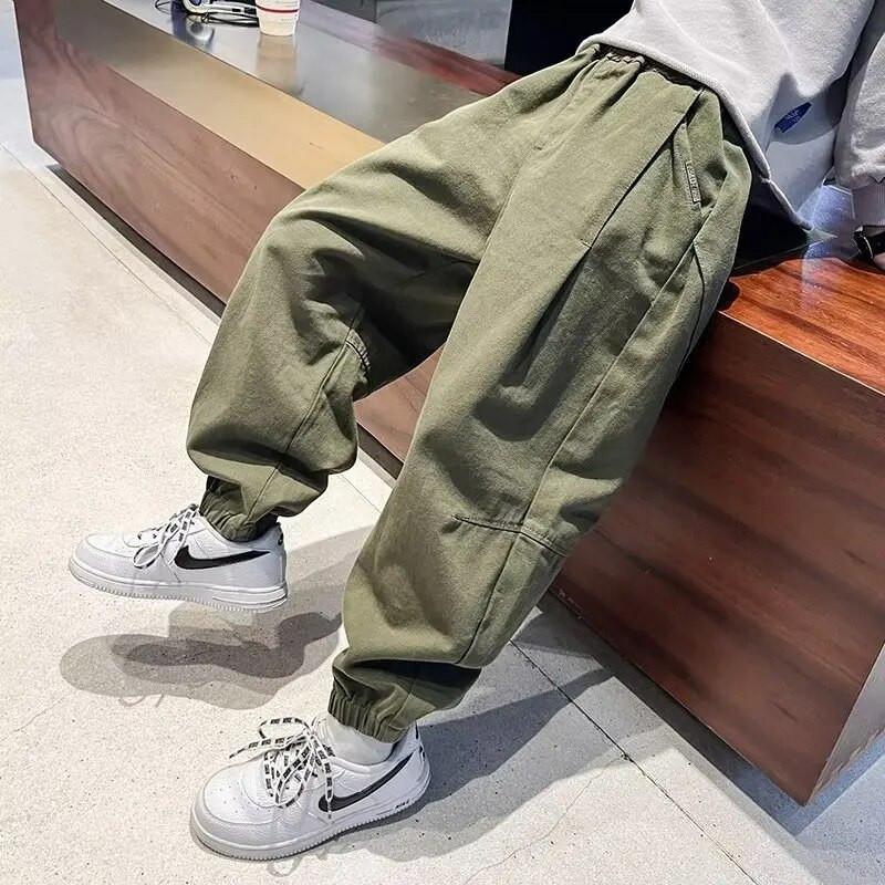 Bērnu bikses, vīriešu rudens un ziemas plīša darba apģērbs un ikdienas bikšu tendences ar lieliem bērnu rudens legingiem