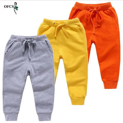 Нови памучни панталони за продажба на дребно за 2-10 години Едноцветни момчета Момичета Ежедневни спортни панталони Jogging Enfant Garcon Детски детски панталони