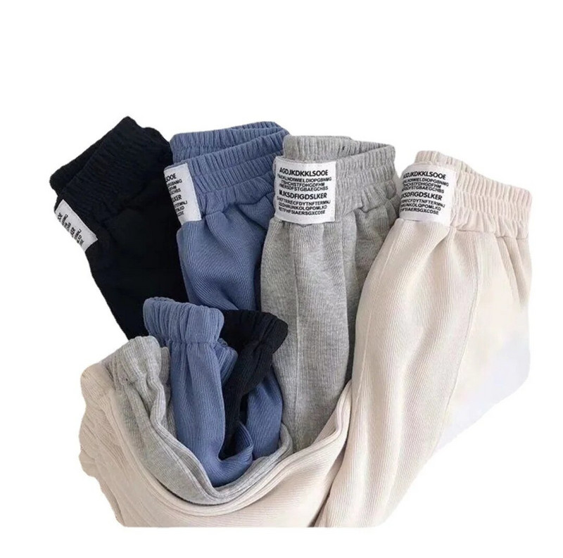 Pavasarį ir rudenį Naujos vaikiškos kelnės Vieno stiliaus berniukų ir mergaičių mados Viską atitinkančios medvilnės vaikiškos sportinės kelnės Laisvalaikio kelnės