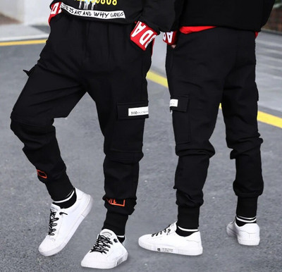 Zēniem lielas kabatas sporta bikses rudens jauni bērni garās bikses pusaudžu zēni meitenes kravas harēm bikses sporta skriešanas bikses 4 6 8 10 gadus vecas