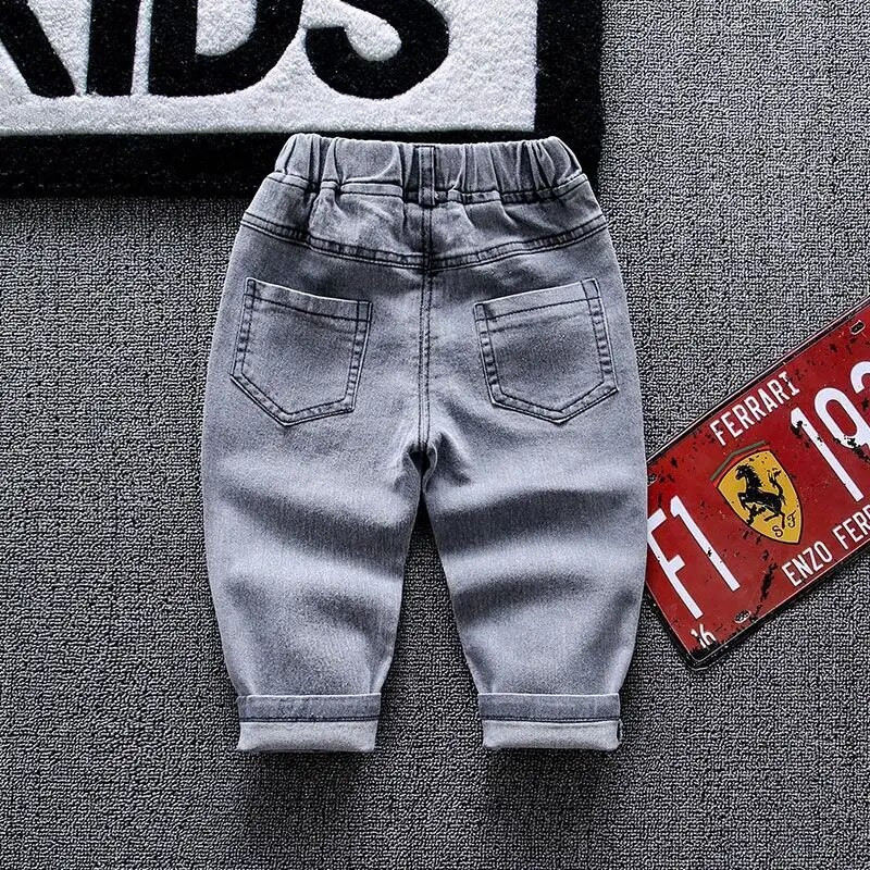 Dječje hlače Hlače za male dječake Rastezljive traperice Dječje traperice Grafičke traperice Jesenska odjeća za dječake Svestrani ležerni kostimi Hlače za noge
