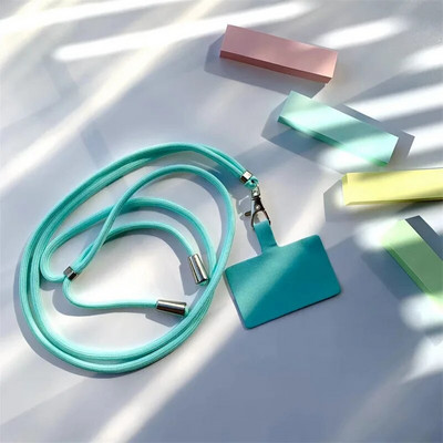 Universāla regulējama tālruņa siksniņa pret nozaudēšanu, noņemama krāsaina kakla vads Tālruņa drošības piesiet atslēgu piekariņa ķēdes virve