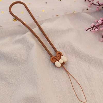 Cute Bow Personality Creative Universāls pret pazaudēšanu mobilā telefona apvalks Mobilā tālruņa aukla Šķidrais silikona mīksts kulons