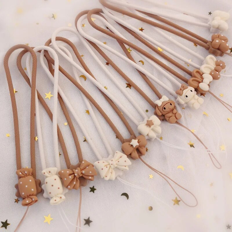 Cute Bow Personality Creative Universāls pret pazaudēšanu mobilā telefona apvalks Mobilā tālruņa aukla Šķidrais silikona mīksts kulons