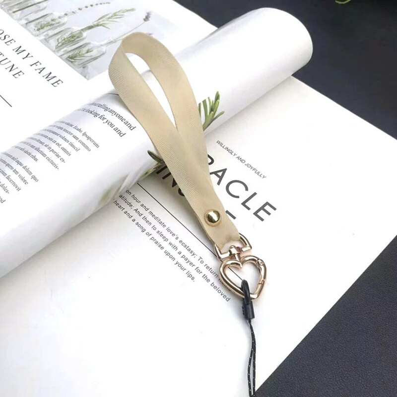 Jauna modes sirds tālruņa aukla sievietēm Tālruņa plaukstas vads Pretnozaudēšanas štropes siksniņa Tālruņa drošības saite Atslēgu piekariņa ķēdes virve