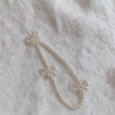 Korejas tālruņa siksniņa Rokassprādze Caurspīdīga kristāla Bowknot Pērlītes Iekarināms Vads Mobilais Mugursoma Kulons Virves šarms Aksesuāri