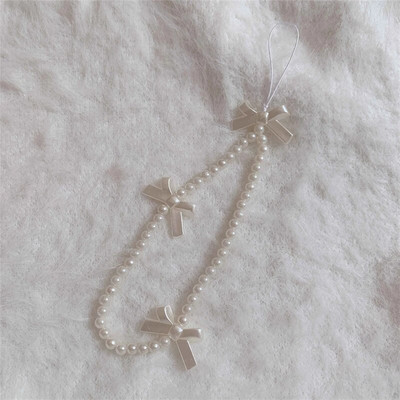 Korejas tālruņa siksniņa Rokassprādze Caurspīdīga kristāla Bowknot Pērlītes Iekarināms Vads Mobilais Mugursoma Kulons Virves šarms Aksesuāri