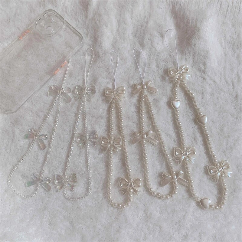 Korejas tālruņa siksniņa Rokassprādze Caurspīdīga kristāla Bowknot Pērlītes Iekarināms Vads Mobilais Mugursoma Kulons Virves šarms Aksesuāri