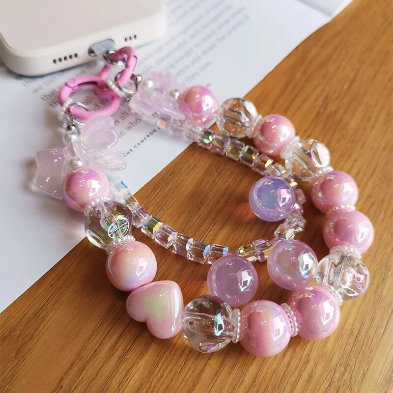 Kratki privjesak sa šarenom leptir mašnom i privjeskom s perlama Univerzalna telefonska torbica s kopčom koja se ne spušta Uzica za mobilni telefon