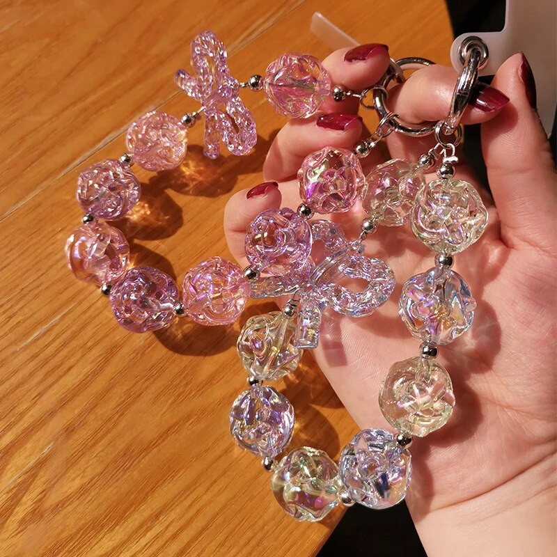 Mobilā tālruņa aukla īsa stila plaukstas kulons priekšgala mezgla ķēde kristāla pērlīšu ziedu kulons universāls tālruņa futrālis pret nozaudēšanu