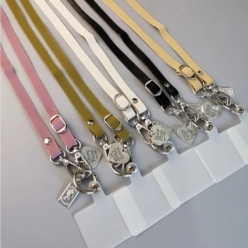 Mobilā tālruņa siksna Vienkārša ādas štrope, gara šķērskorpusa siksnas siksnas tips Universāls pret nozaudēšanu mobilā tālruņa aukla atslēgām