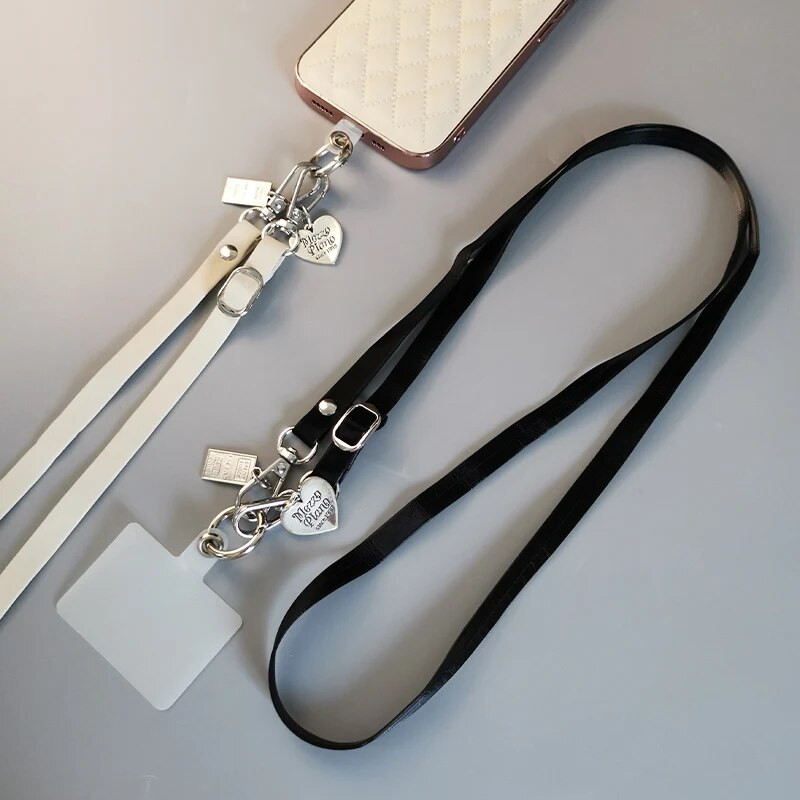 Mobilā tālruņa siksna Vienkārša ādas štrope, gara šķērskorpusa siksnas siksnas tips Universāls pret nozaudēšanu mobilā tālruņa aukla atslēgām