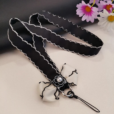 Garā Camellia Virsne Gara kakla tālruņa siksna Plīša siksna Mobilā tālruņa plaukstas siksna Pretnozaudēšanas kakla siksna Pretnozaudēšanas siksna