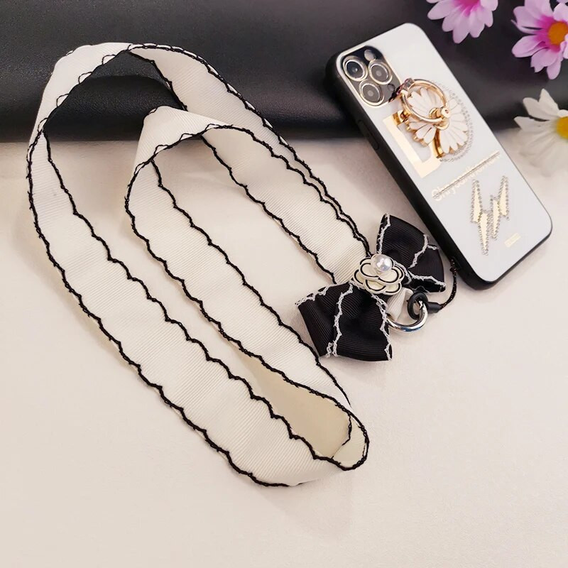 Garā Camellia Virsne Gara kakla tālruņa siksna Plīša siksna Mobilā tālruņa plaukstas siksna Pretnozaudēšanas kakla siksna Pretnozaudēšanas siksna