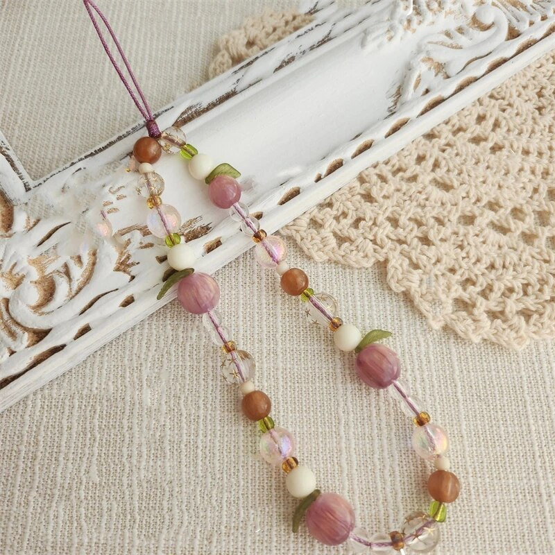 INS 3D plūmju jauka tālruņa ķēde, lapas kulons ar pērlītēm, tālruņa aukla iPhone 15 aksesuāriem. Tālruņa pakarināšanas virve sievietēm Rotaslietas