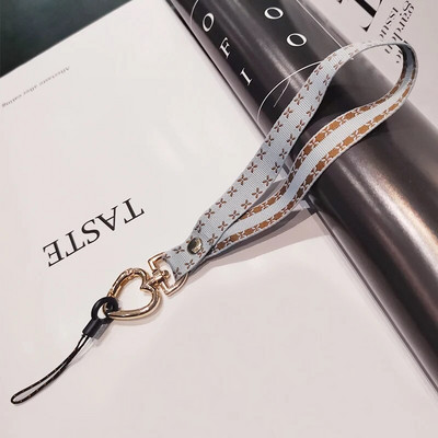 Vienkārša mobilā tālruņa aukla, īsa, sirds formas plaukstas virve pret nozaudēšanu, universāls mobilā tālruņa štrope, aproce, atslēgu piekariņa austiņu futrālis