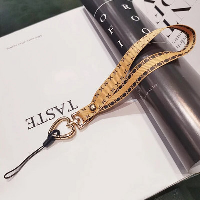 Vienkārša mobilā tālruņa aukla, īsa, sirds formas plaukstas virve pret nozaudēšanu, universāls mobilā tālruņa štrope, aproce, atslēgu piekariņa austiņu futrālis