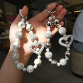 Mobilā tālruņa virves plaukstas locītavas īsa ūdens dimanta bumbiņa, kas ir izdobta Love Pilna dimanta lodīšu kulons universāla siksna pret zudumu