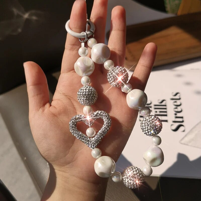 Mobilā tālruņa virves plaukstas locītavas īsa ūdens dimanta bumbiņa, kas ir izdobta Love Pilna dimanta lodīšu kulons universāla siksna pret zudumu