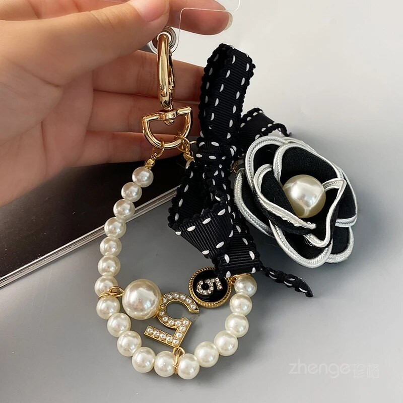 Maza smaržīga ziedu loka pērļu rokassprādze Mobilā tālruņa aukla Sieviešu pārnēsājams piekarināms tālrunis Universāls Pret Loss Štrope