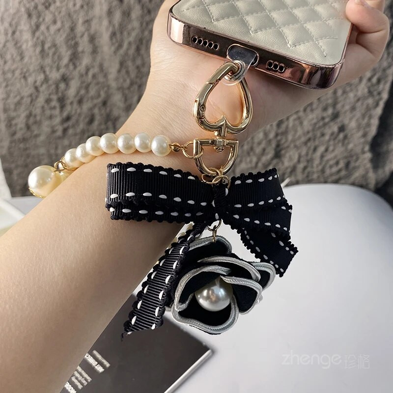 Maza smaržīga ziedu loka pērļu rokassprādze Mobilā tālruņa aukla Sieviešu pārnēsājams piekarināms tālrunis Universāls Pret Loss Štrope