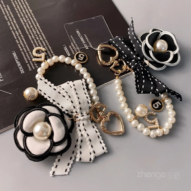 Maza smaržīga ziedu loka pērļu rokassprādze Mobilā tālruņa aukla Sieviešu pārnēsājams piekarināms tālrunis Universāls Pret Loss Štrope