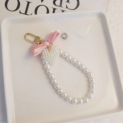 Mobiiltelefoni kaelapael, vöörisõlm, ripatsitüüp