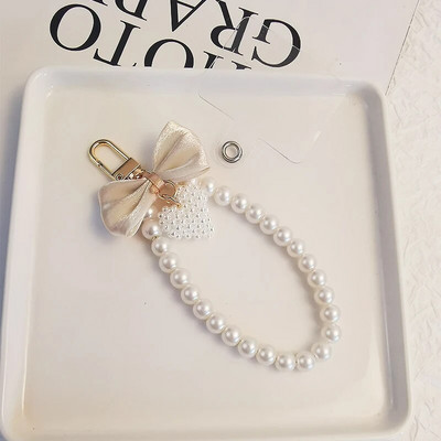 Mobiiltelefoni kaelapael, vöörisõlm, ripatsitüüp