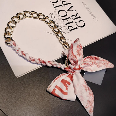 Kõrgekvaliteediline kott-telefoni ümbris, kaotsiminekuvastane pael, kaelarihm, võti, mobiiltelefon, kaelarihm, siidist sall, rippuv kett, punutud vibu metallist ripats