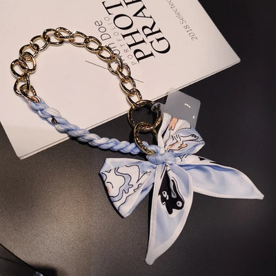 Kõrgekvaliteediline kott-telefoni ümbris, kaotsiminekuvastane pael, kaelarihm, võti, mobiiltelefon, kaelarihm, siidist sall, rippuv kett, punutud vibu metallist ripats