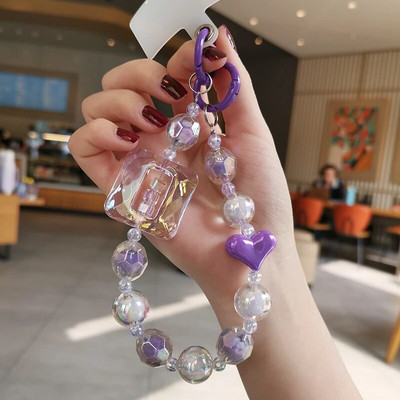 Liela kvadrātveida kristāla pērlīšu plaukstas siksna mobilā tālruņa siksna ar daudzpusēju dimanta pērlīšu kulonu tālruņa pret nokrišanu klipšu stila siksniņa