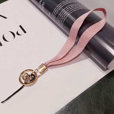 Mobilā tālruņa aukla sieviešu plaukstas virve plata auduma īsa štrope siksniņa kulonu apvalka rotājumi pārnēsājams noņemams atslēgu piekariņš