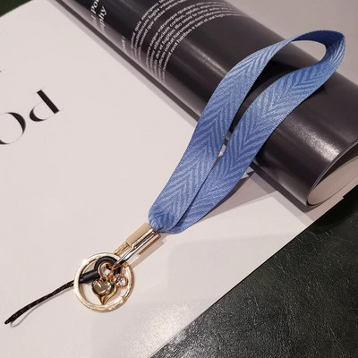 Mobilā tālruņa aukla sieviešu plaukstas virve plata auduma īsa štrope siksniņa kulonu apvalka rotājumi pārnēsājams noņemams atslēgu piekariņš